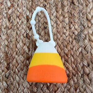 Bath and Bodywork’s Candy Corn pocketbac sanitizer holder